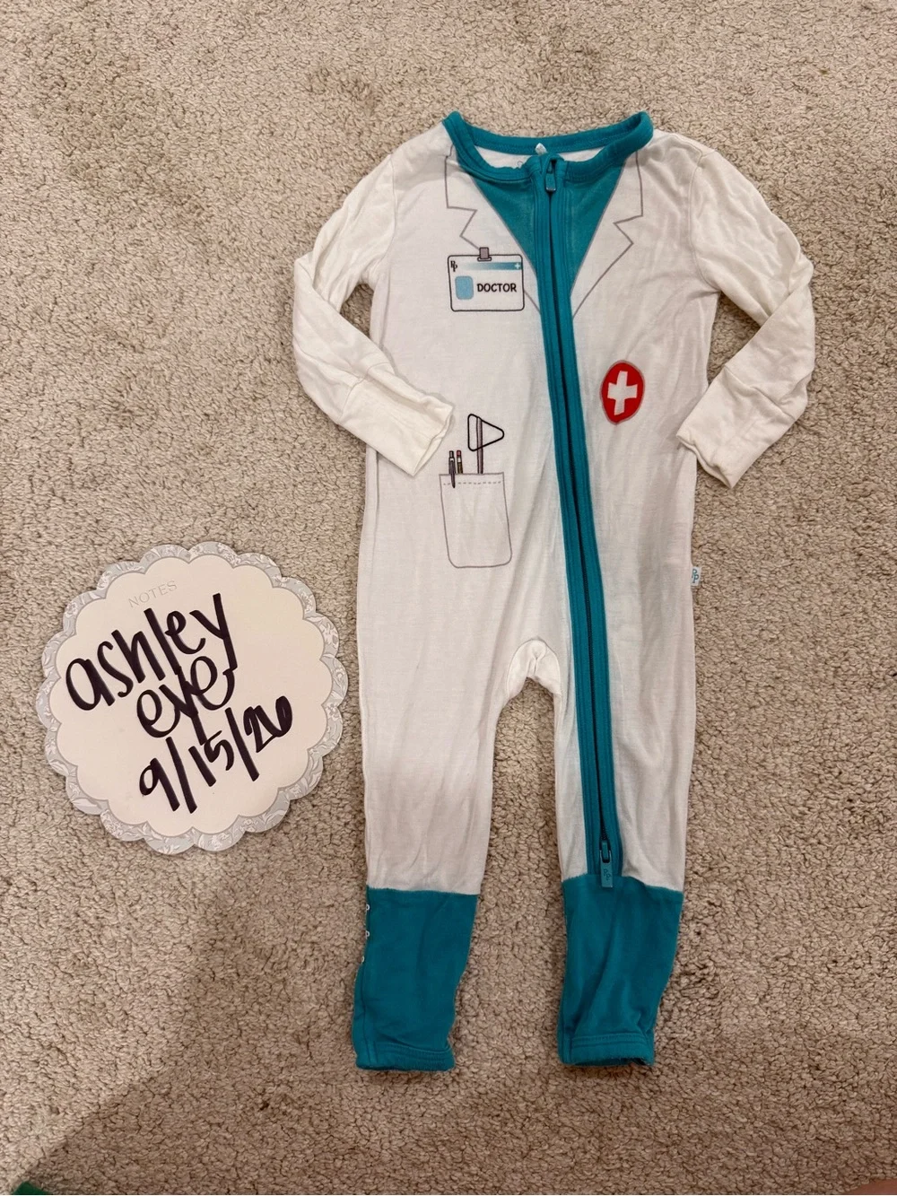 Posh Peanut White Footie with Teal Trim and Red Cross